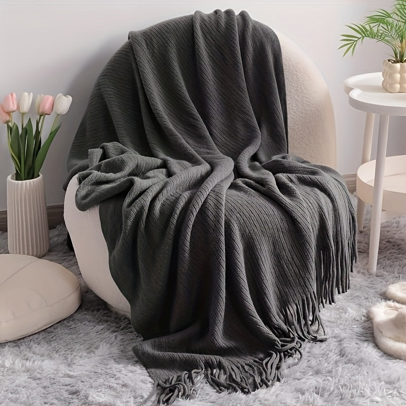 Manta boho tejida con flecos